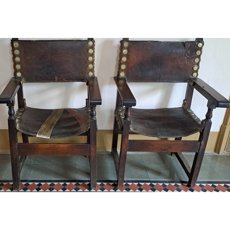 Pair of frail armchairs, walnut wood, leather upholstery. 18th century