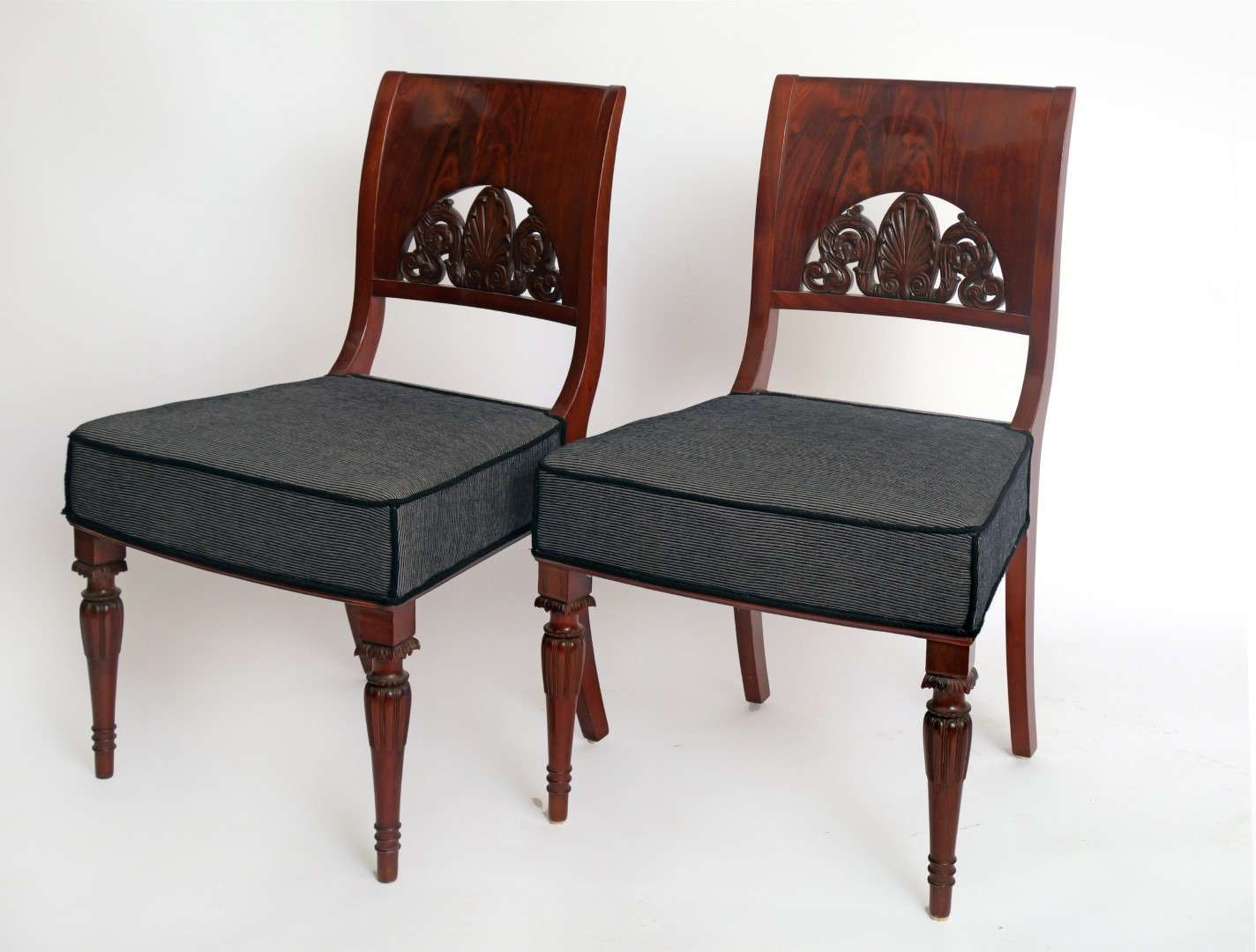 Pair of 19th Century Chairs with Rich Carving